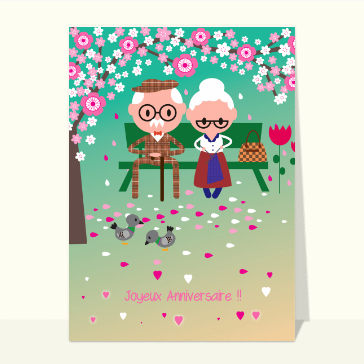 Vieux couple sous un cerisier fleuri