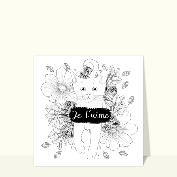 Chat amoureux parmi les fleurs &eacute;panouies