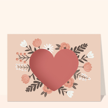 Coeur rose au milieu de fleurs douces
