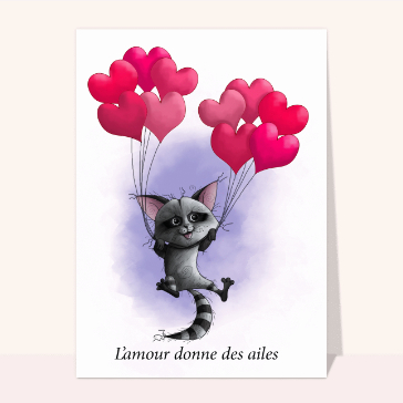 Un chat en flott&eacute;e de coeurs d'amour