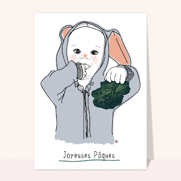Lapin adorable avec une feuille de laitue