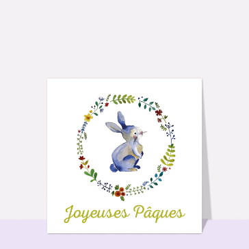 Lapin d&eacute;licat entour&eacute; de fleurs printani&egrave;res