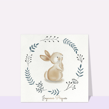 Lapin mignon au milieu des fleurs de P&acirc;ques