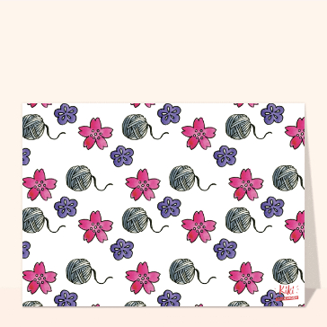 Pelotes de laine et fleurs color&eacute;es