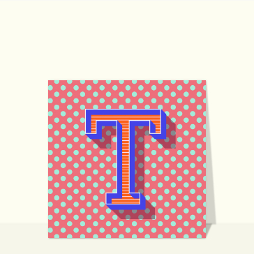 Lettre T color&eacute;e sur fond &agrave; pois graphique