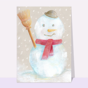 Bonhomme de neige souriant sous la neige