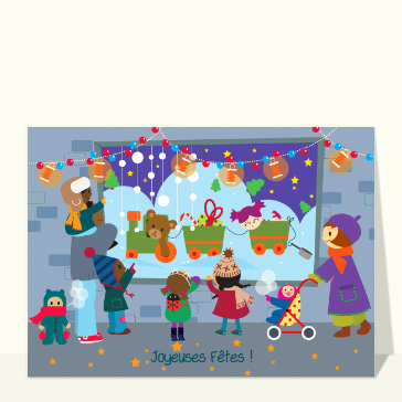 Enfants &eacute;merveill&eacute;s devant le sapin de No&euml;l