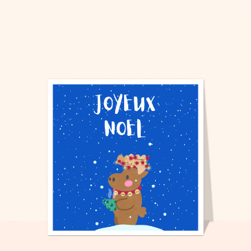 Renne mignon avec un cadeau de No&euml;l