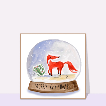 Renard joyeux dans une boule de neige