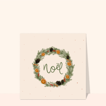Couronne de No&euml;l agr&eacute;ment&eacute;e d'agrumes et de pins