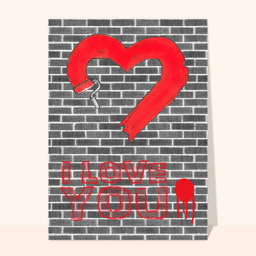 Carte St Valentin street art : I love you sur un mur de briques