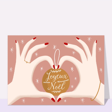 carte de noel : Boule de Noël dans des mains en coeur